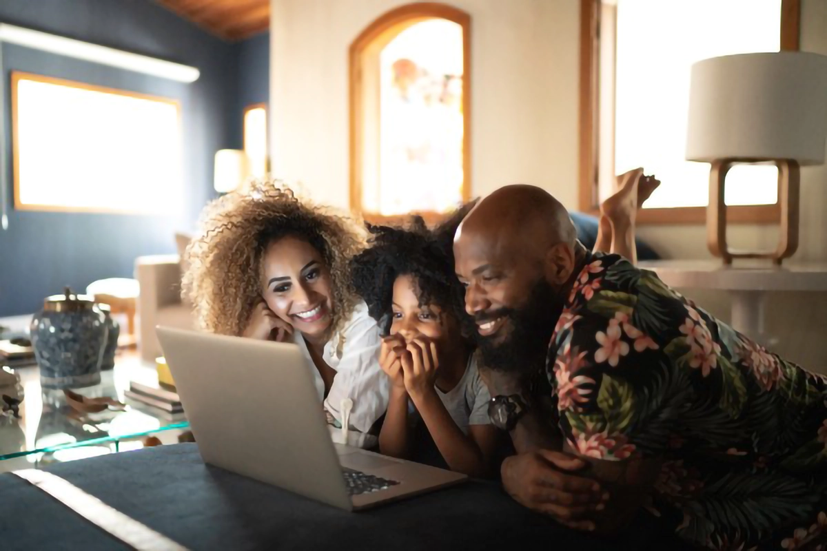 family using laptop